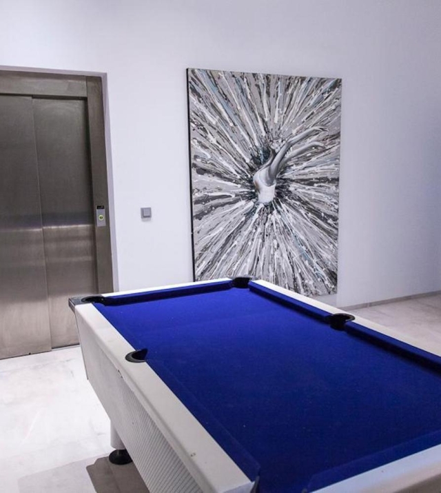 Resa estates Ibiza modern villa Cala llonga golf sale te koop playroom.jpg